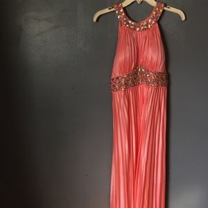 Peach colored shiny prom dress
